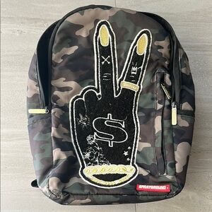 Sprayground Camouflage Backpack with Peace Sign Patch
